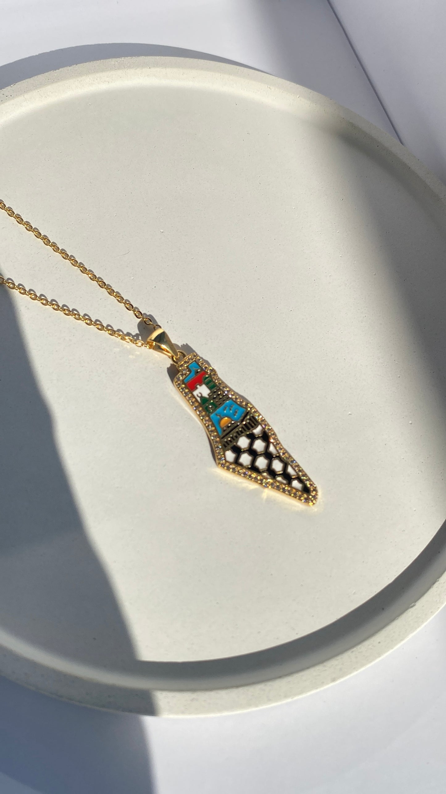 Palestine shimmer map necklace with abstract colors in gold