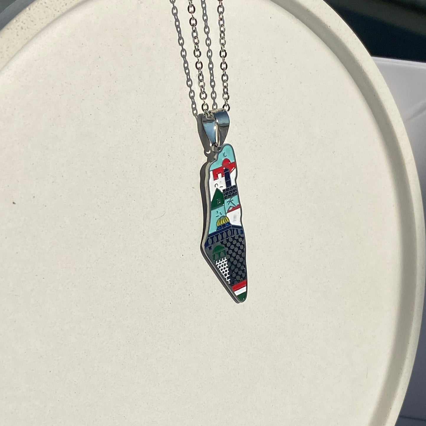 Palestine map necklace with abstract colors in silver