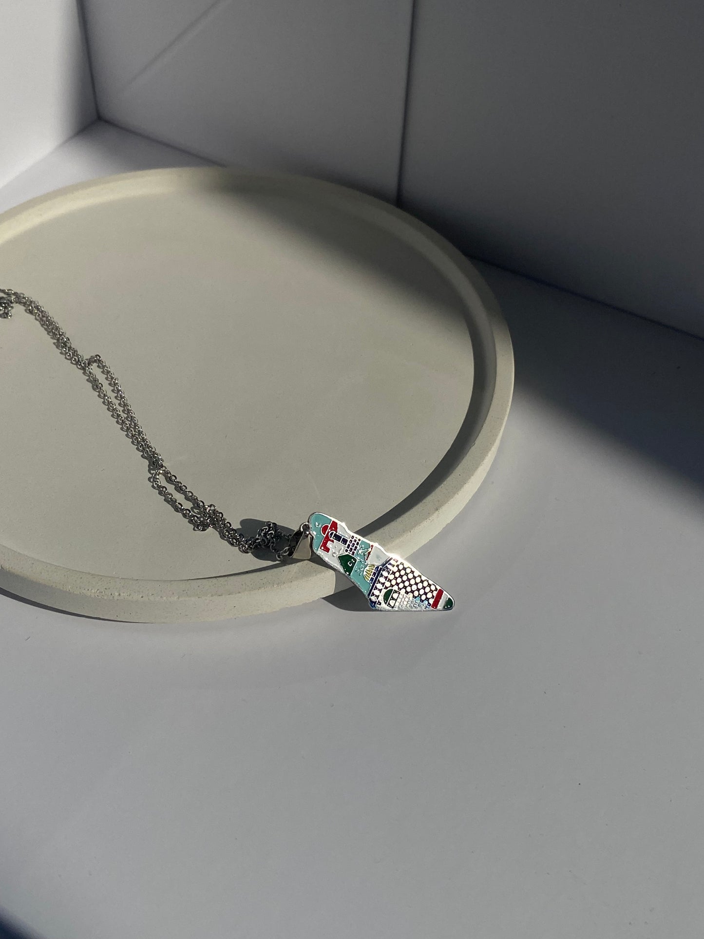 Palestine map necklace with abstract colors in silver
