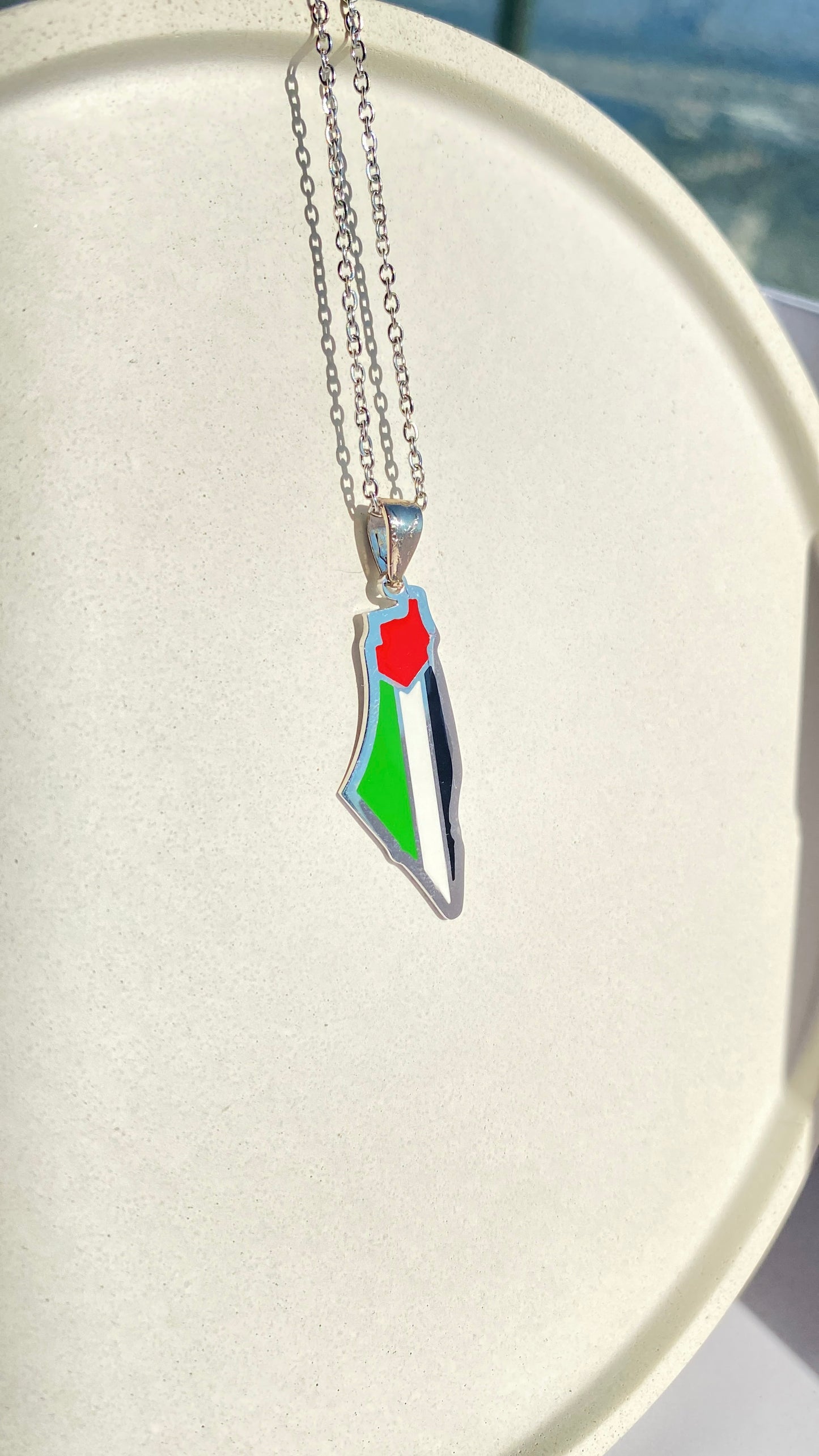 Palestine flag colors in map shape in silver
