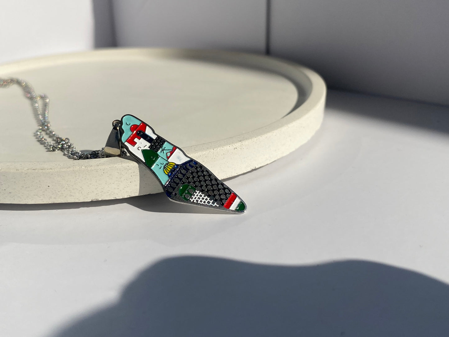 Palestine map necklace with abstract colors in silver